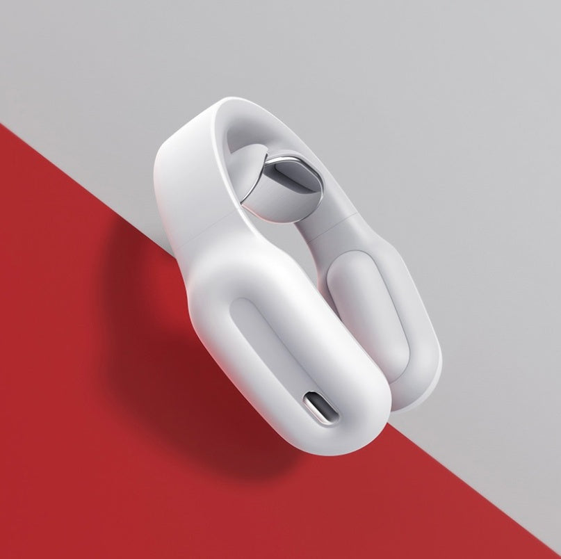PostureNeck Pro — contenuto della confezione con telecomando e cavo USB